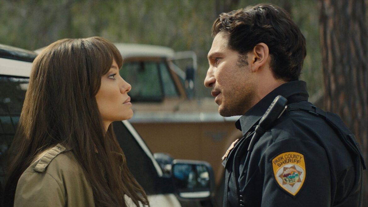 A man and woman standing next to each other.